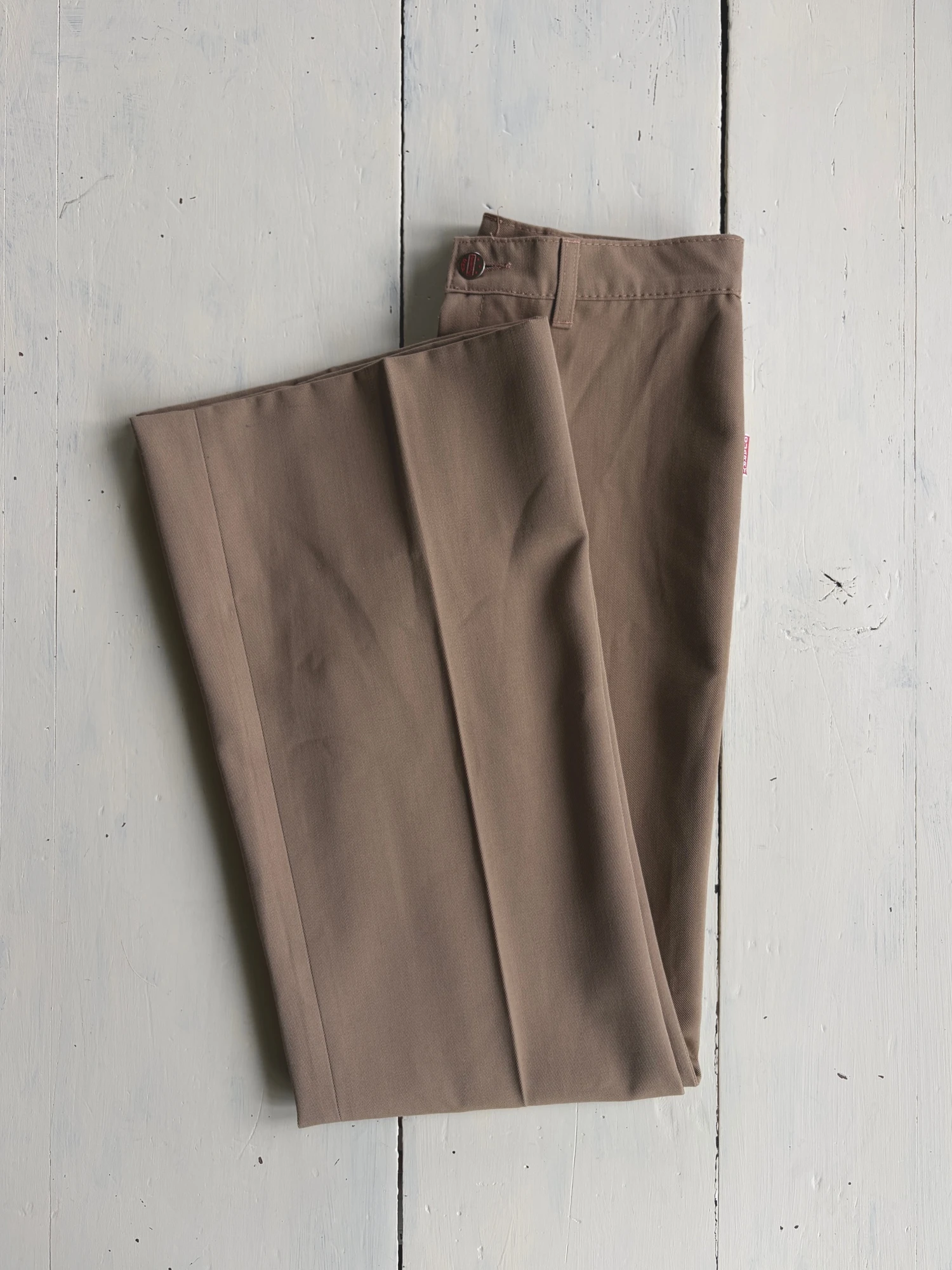 beige flared trousers