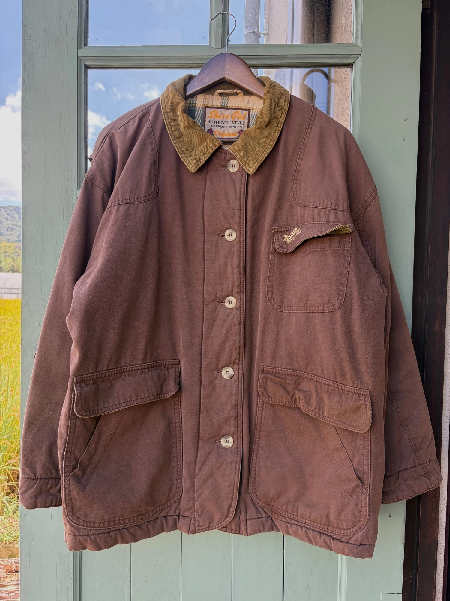 She's a girl brown hunting  jacket 8