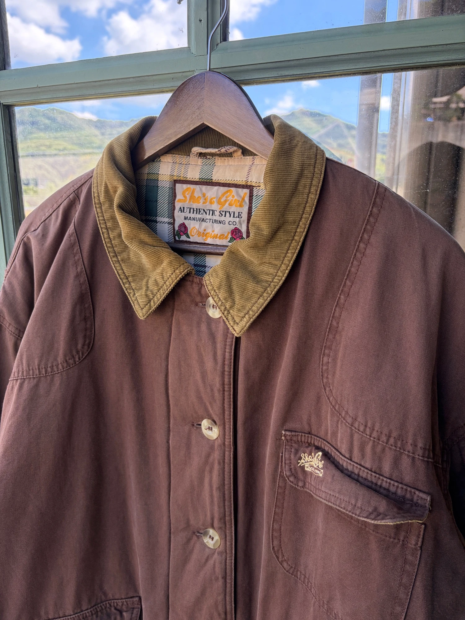 She's a girl brown hunting  jacket 9