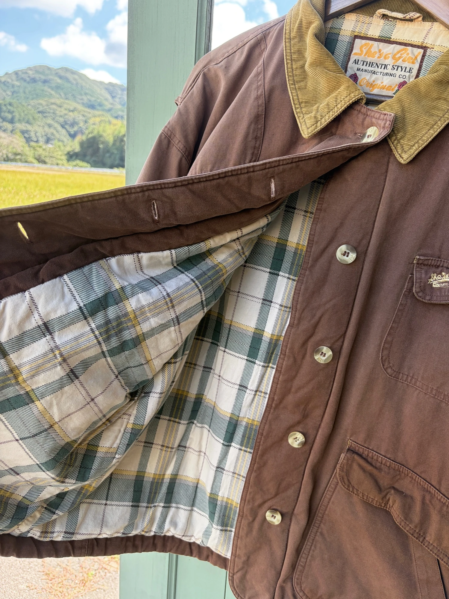 She's a girl brown hunting  jacket 11
